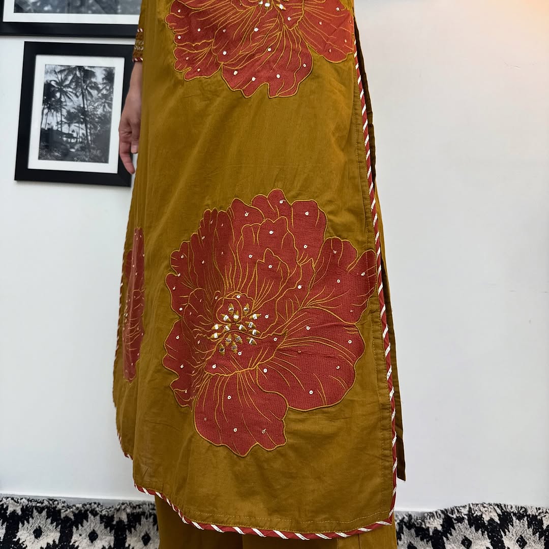 Festive Gulhad Wear

Machine sequin embroidered A line kurta with embroidered lace with lace detailed palazzo printed cotton dupatta