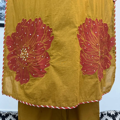 Festive Gulhad Wear

Machine sequin embroidered A line kurta with embroidered lace with lace detailed palazzo printed cotton dupatta